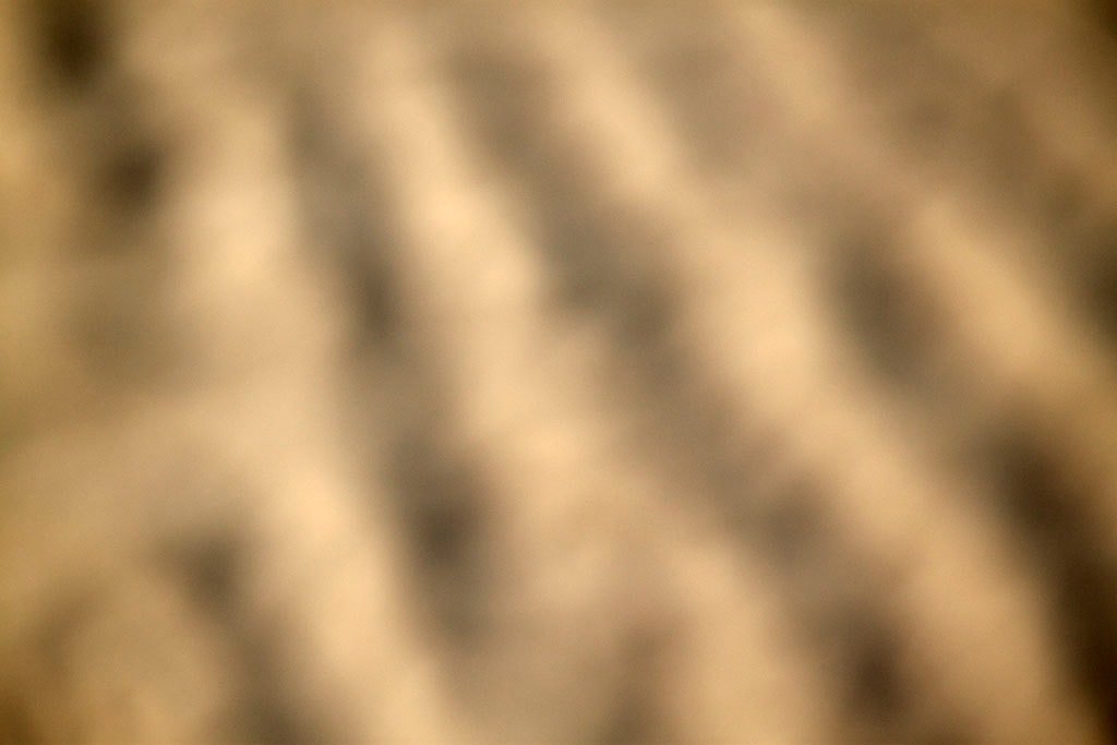 Depoe Bay, OR 2017 — warm sand ripple abstract, diagonal wave forms in golden sepia tones