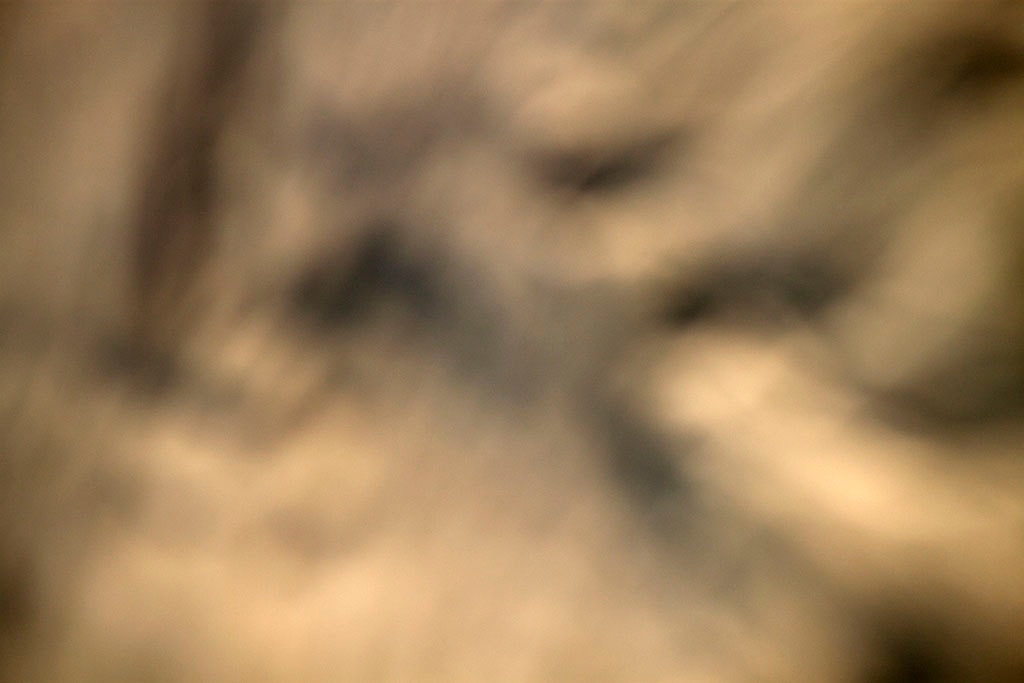 Depoe Bay, OR 2017 — warm sepia abstract, blurred intersecting forms with dark diagonal shadow