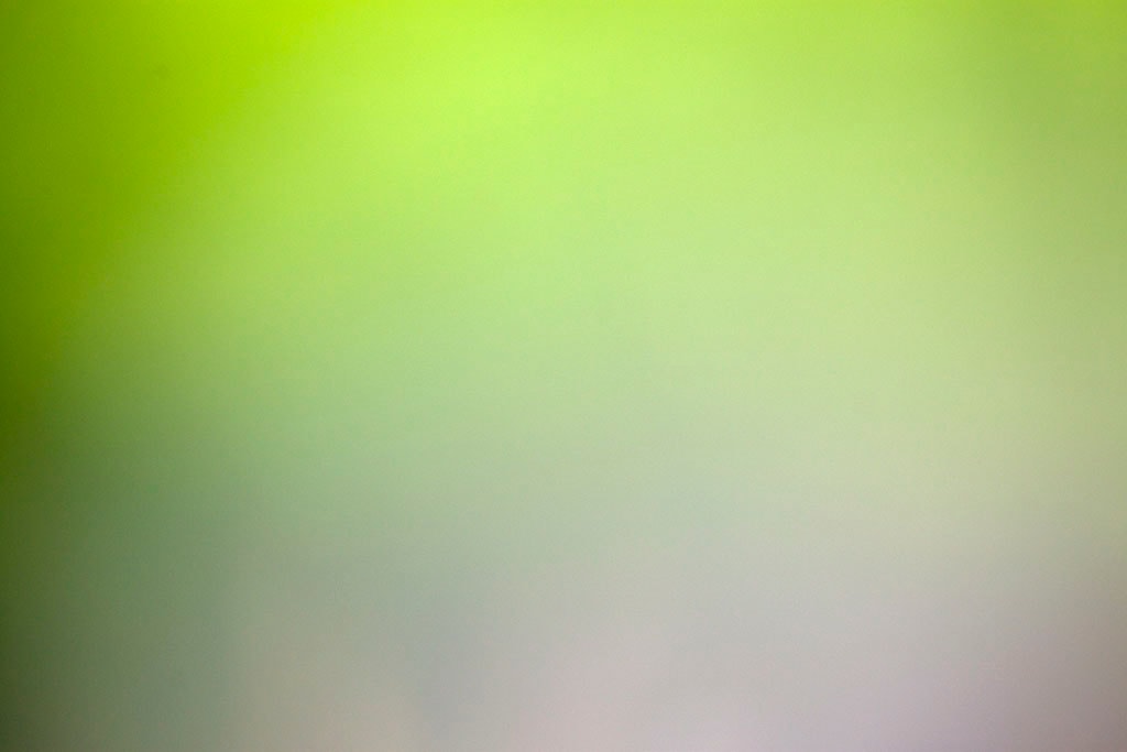 Maui, Hawaii 2018 — vivid lime-green gradient abstract, bright chartreuse upper half fading to soft cool grey-white lower half