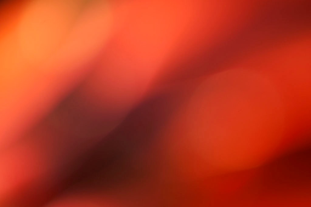 Maui, Hawaii 2018 — warm terracotta abstract, soft orange-red ground with dark brown diagonal shadow band from upper left to lower center