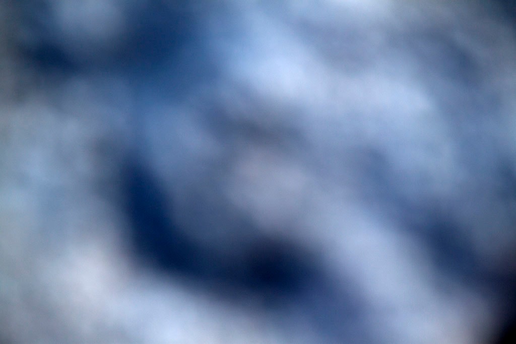 Yellowstone, WY 2016 — deep blue swirling cloud abstract