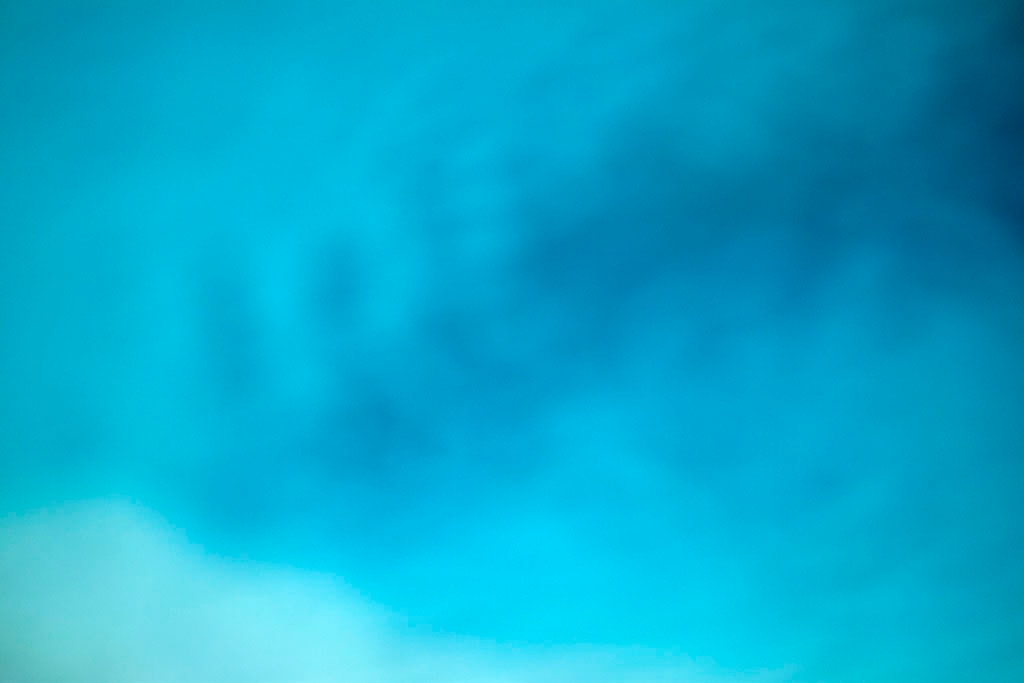 Yellowstone, WY 2016 — soft blue sky with dark cloud abstract