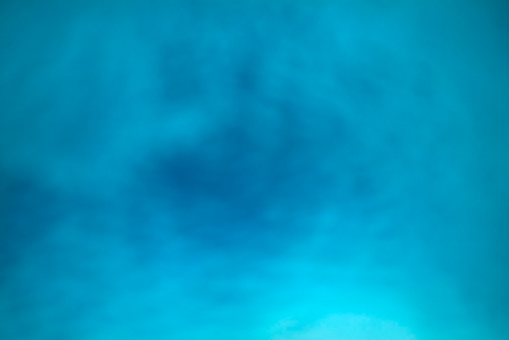 Yellowstone, WY 2016 — deep teal blue cloud abstract with dark center