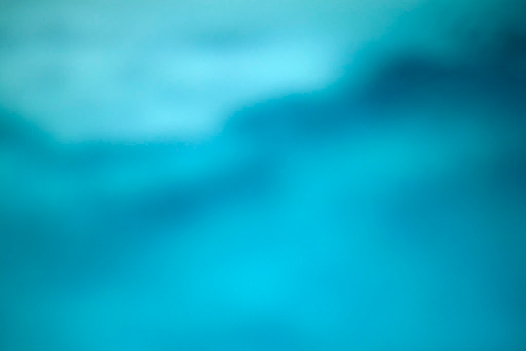 Yellowstone, WY 2016 — blurred teal blue cloud with diagonal light band