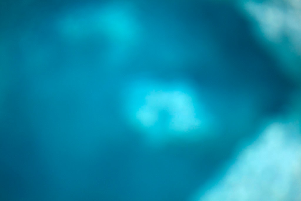 Yellowstone, WY 2016 — deep teal blue with soft white cloud orbs