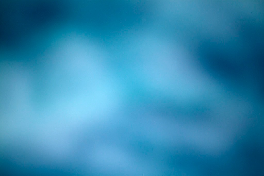 Yellowstone, WY 2016 — deep blue cloud abstract with white cloud mass